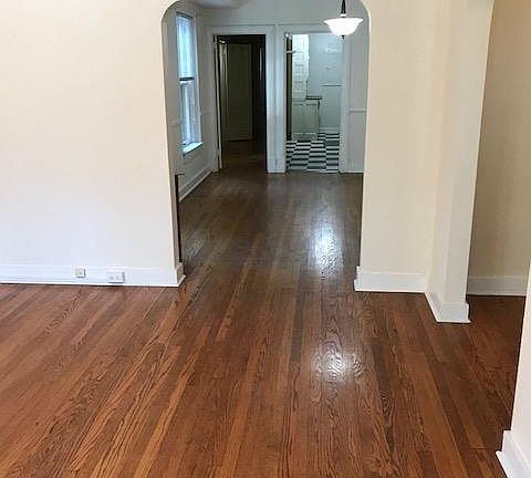 Living room looking into dining room/kitchen