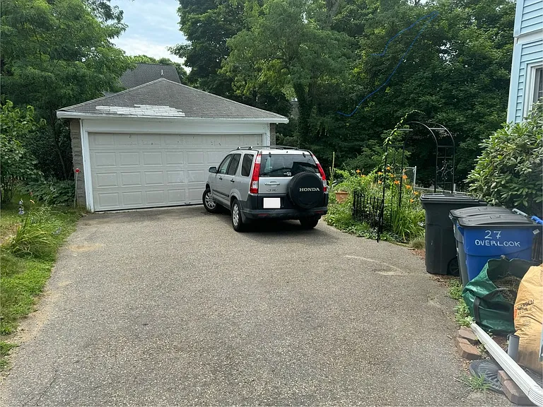 Garage and gate to the backyard.