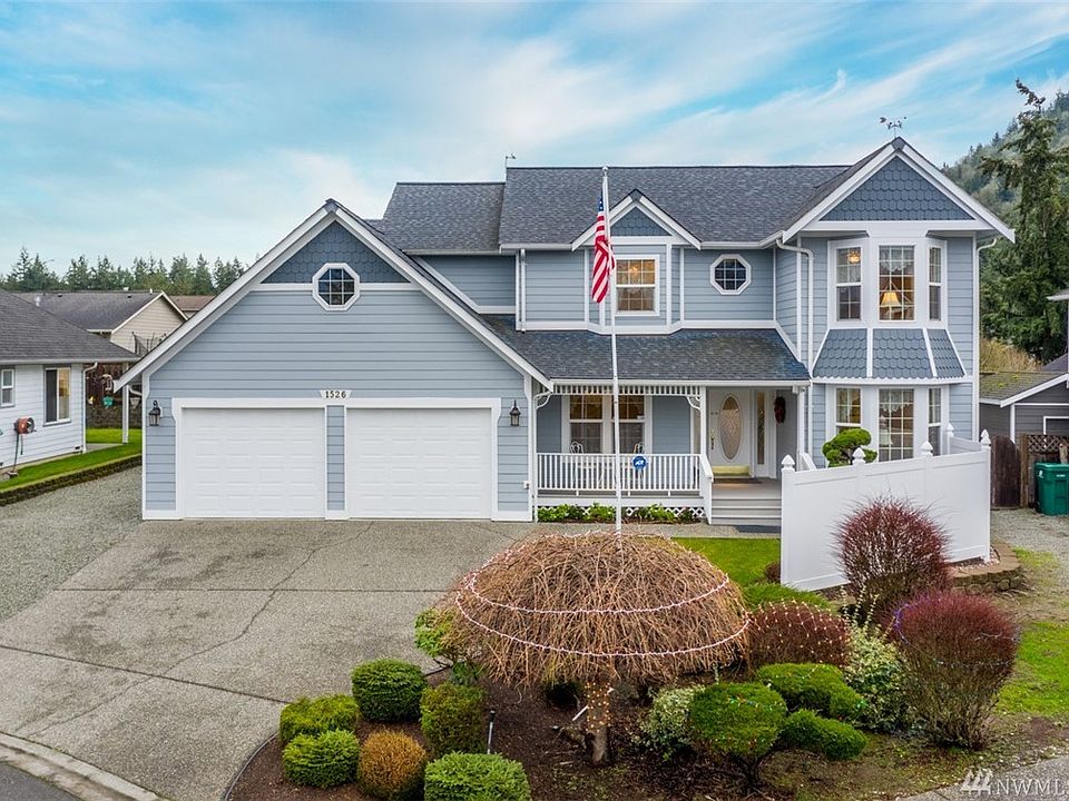 Beautiful home on the hill with lots of curb appeal.