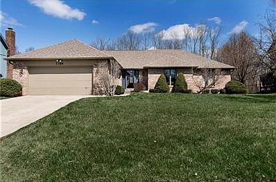 Quality, solid brick ranch home with wooded views