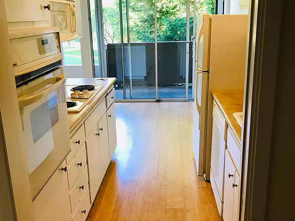 kitchen looking towards dining area and balcony
