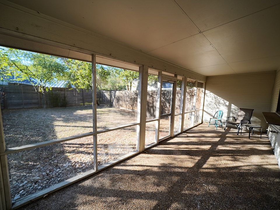 Large screened in back porch and private shaded yard