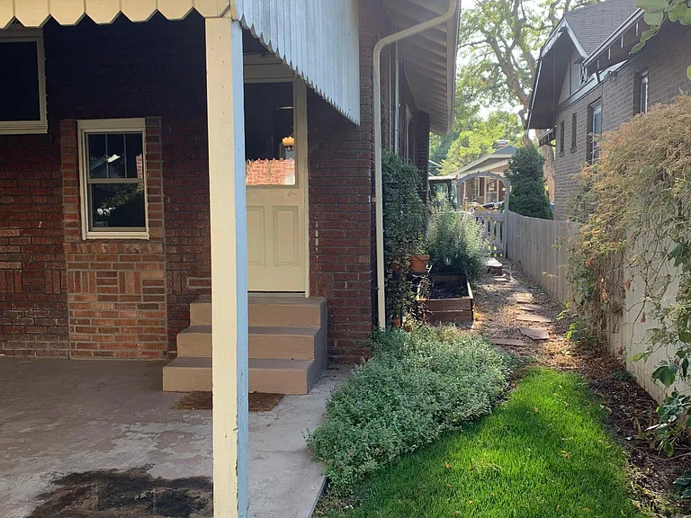 Side yard with raised garden