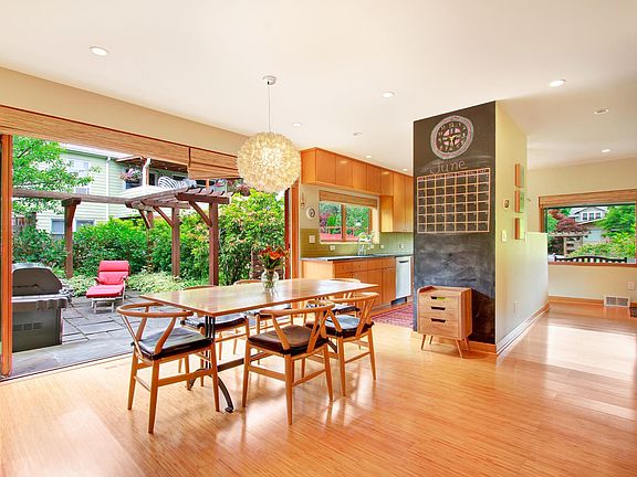 Dining Room with accordion doors and chalk board wall.