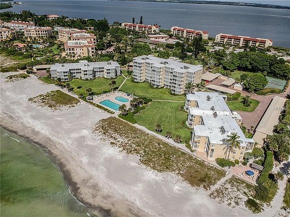 Front and center views from the top floor unit on one of two balconies.  Imagine waking to this or the sunsets going to sleep th