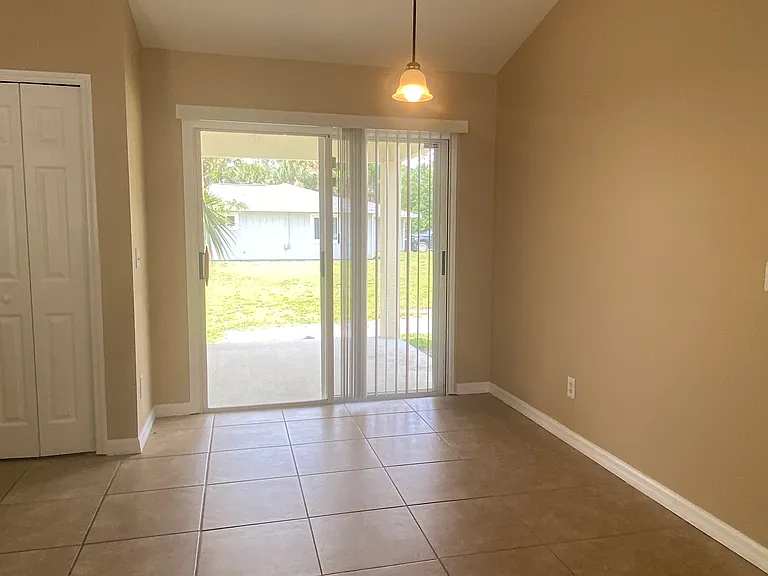 dining area opens to covered porch