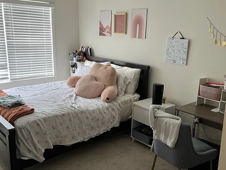 One of 3 bedrooms upstairs. Blinds remain, furniture does not. Large double windows in each bedroom, newer carpet and large closets.