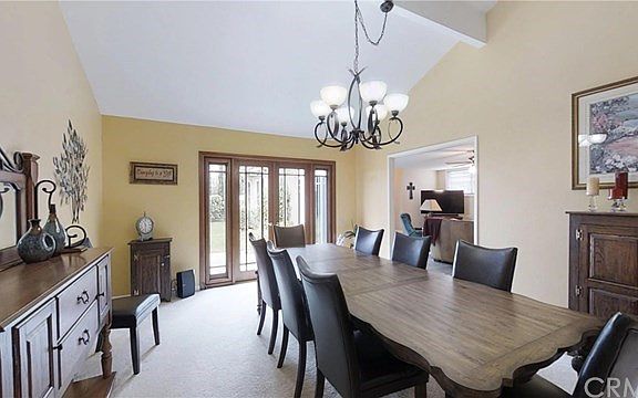 Front entry opens to this vaulted room that can serve as formal dining or living space.