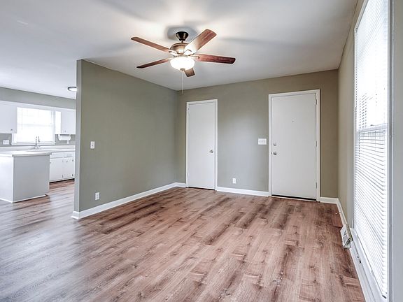 View from the living room into the kitchen and dinning area - nice open concept floor plan