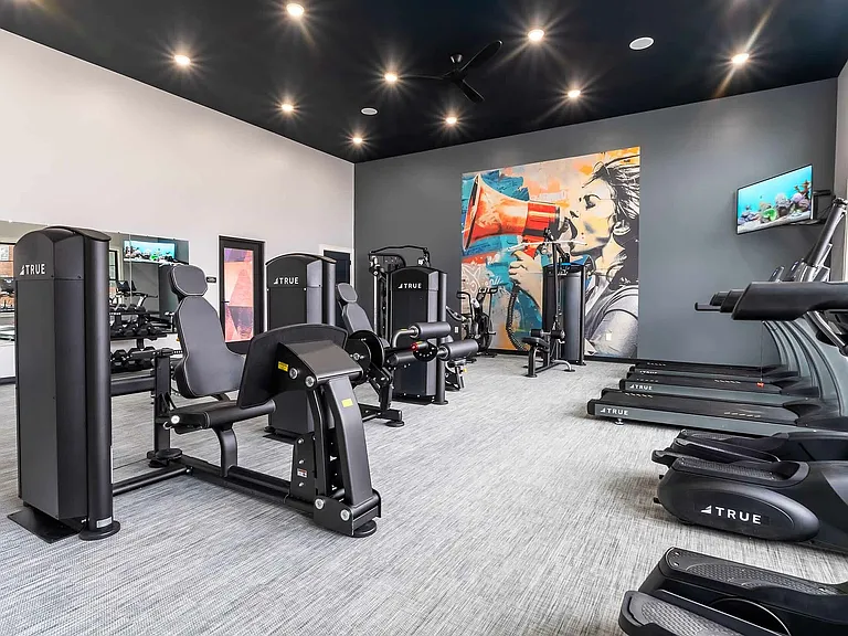 Experience the ultimate workout in this fully-equipped, stylish fitness center.