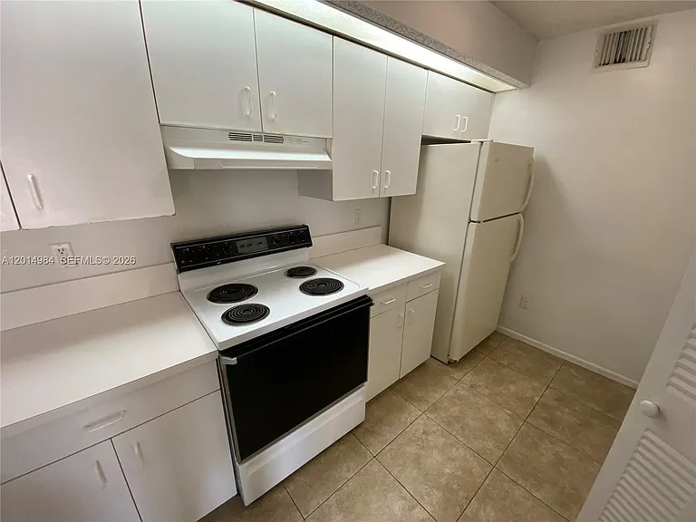 18820 NW 57th Ave #203 — Photo 12