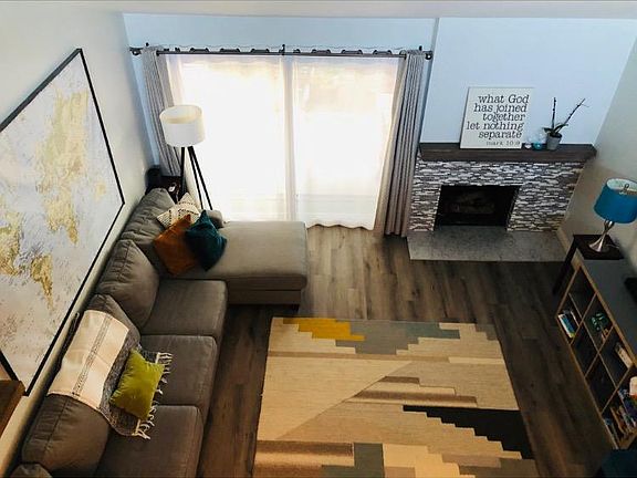 living room with gas/wood burning fireplace