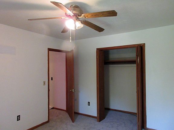 Larger bedroom has large closet