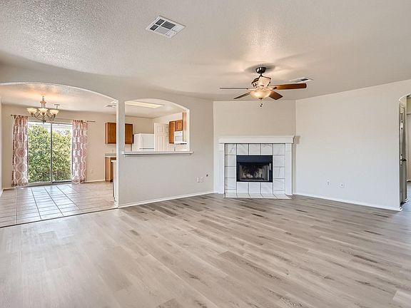 Large open concept living room with fireplace!