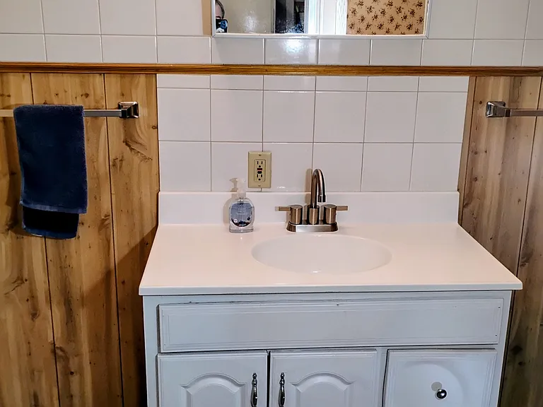 Lighted Vanity in addition to the Bathroom Ceiling Light.