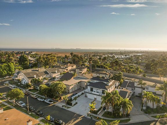 Looking towards the Huntington Beach and Seal Beach coastline approx. 1 mile away, this home is located in a fabulous residential neighborhood with flat streets.