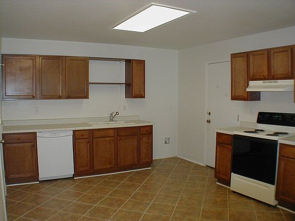 Large Country Kitchen with Ceramic Tile Floors