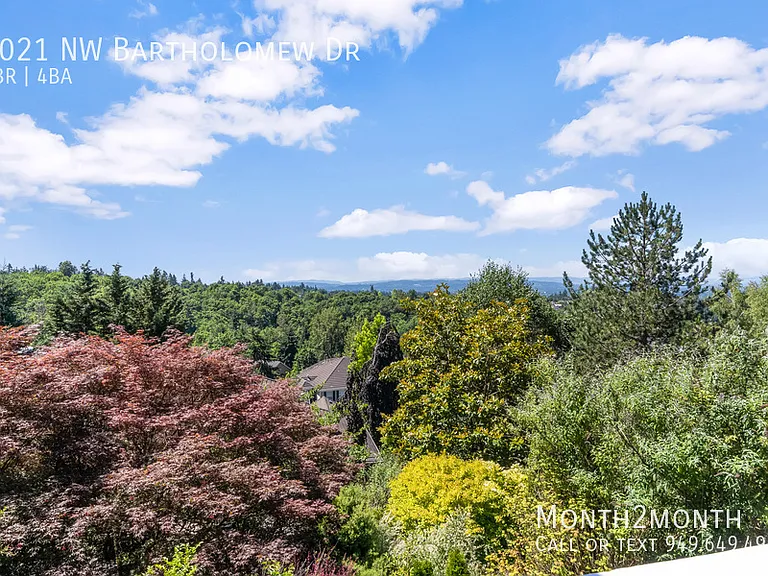 9021 NW Bartholomew Dr — Photo 33