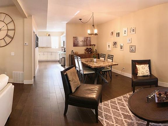 Living room, den and dining room.