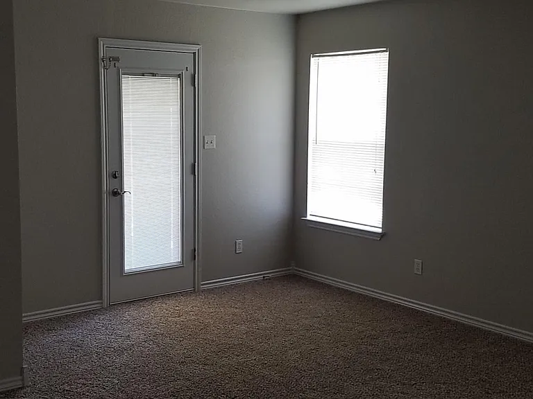 Master bedroom with back patio access