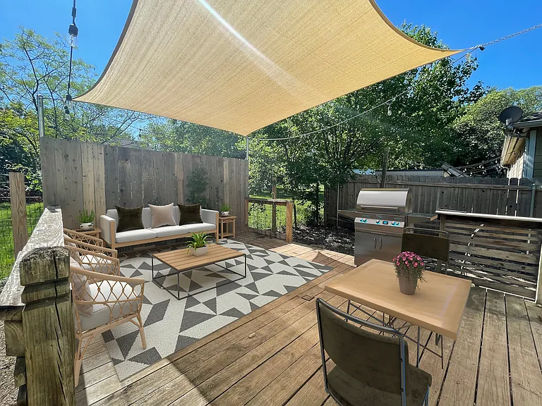 Shade canopy over the large deck off the Kitchen.