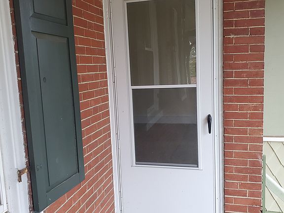 Entrance from side porch. Faces the front of the house.