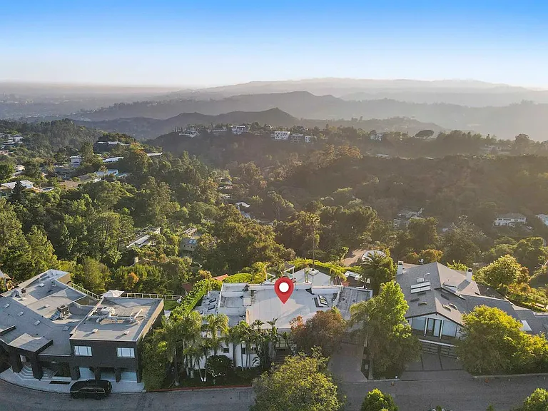 Capture the beauty of the surroundings from a stunning drone shot, revealing the tranquil landscape.