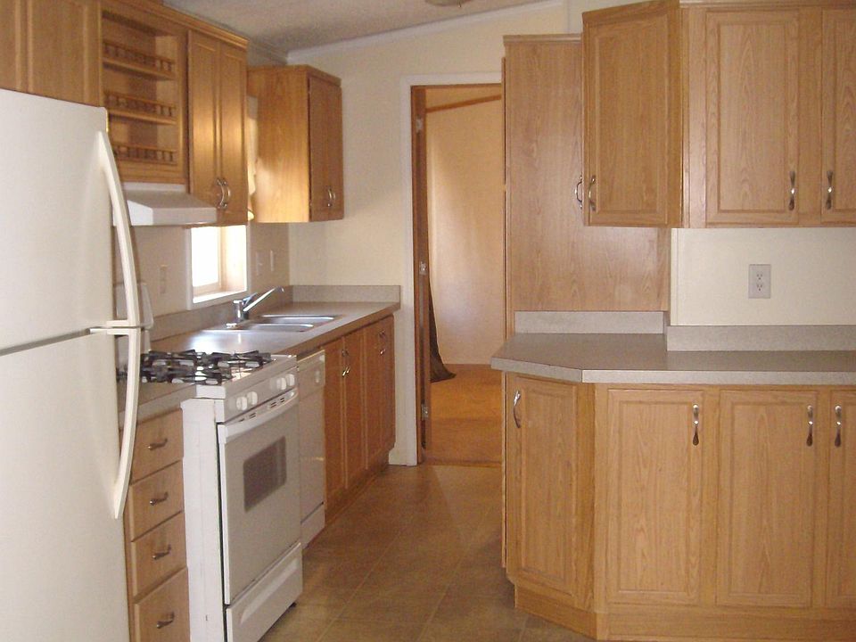 Kitchen leading to master bedroom