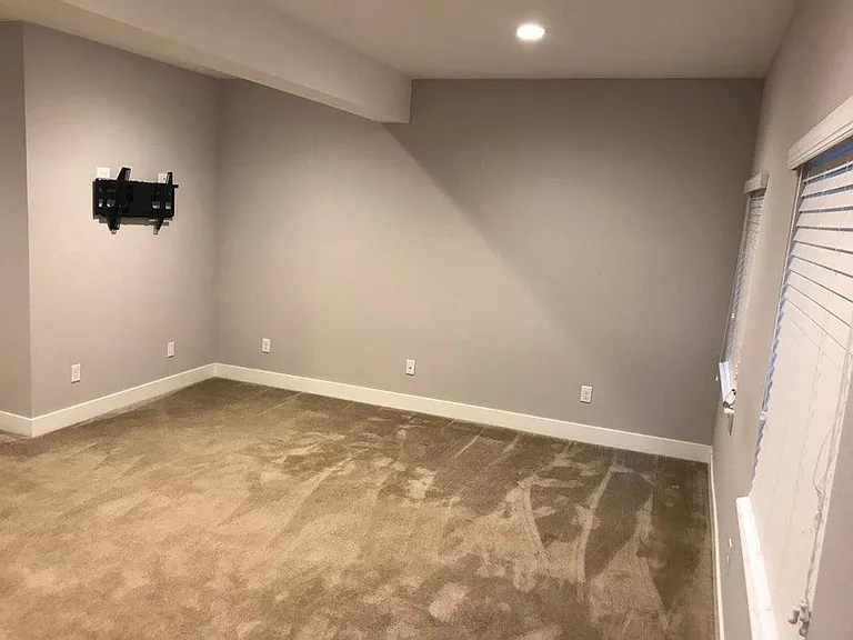 Basement bedroom/recreation area.