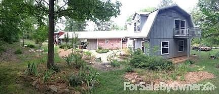 Relaxing landscaped back yard with patio