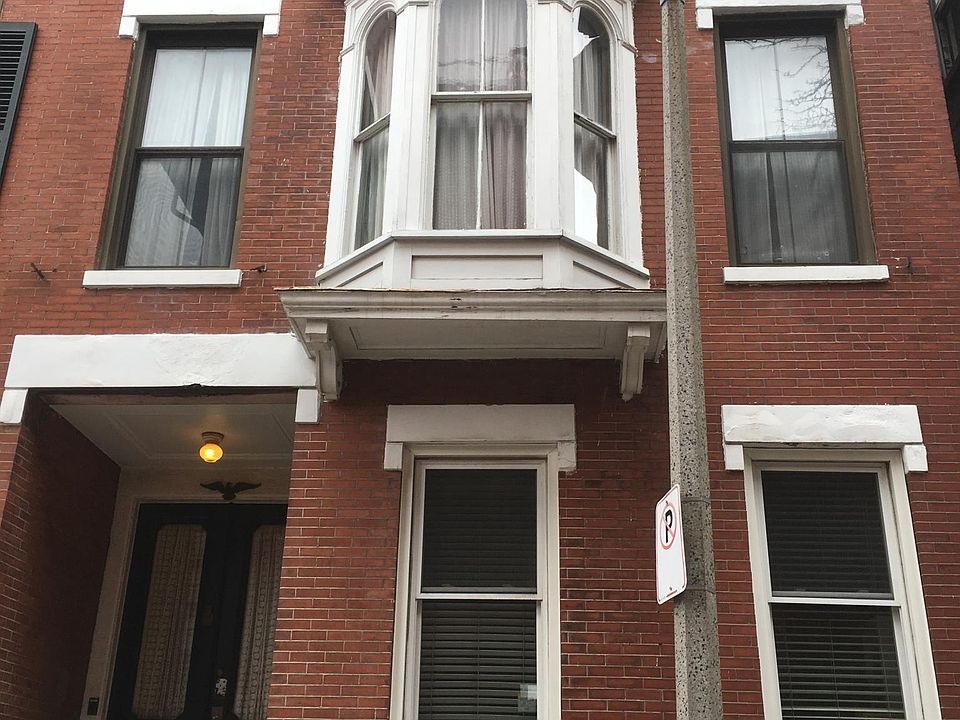 Front of House - Apartment is on 2nd and 3rd Floors