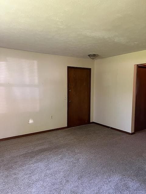 Main floor unit with carport space