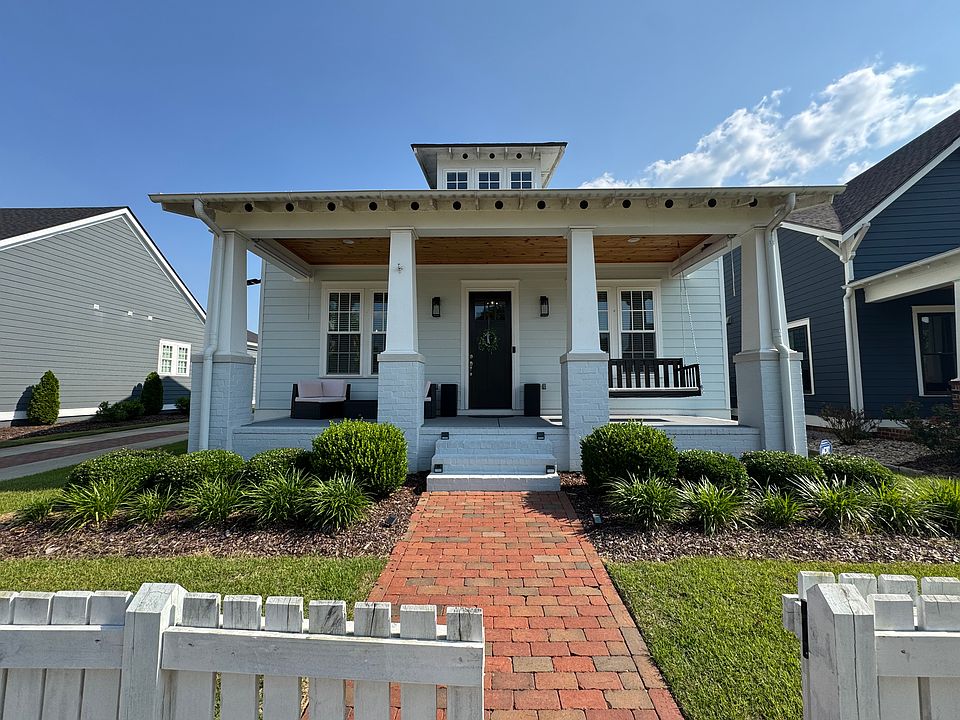 Southern charm at its finest. Sip sweet tea while sitting on your front porch swing.