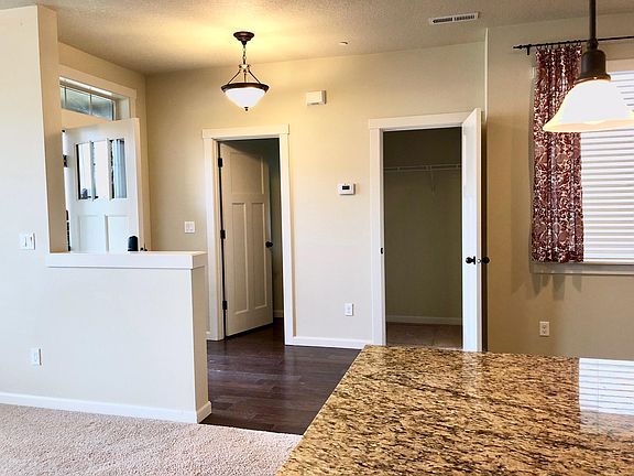 Photo of the front door from the kitchen island.