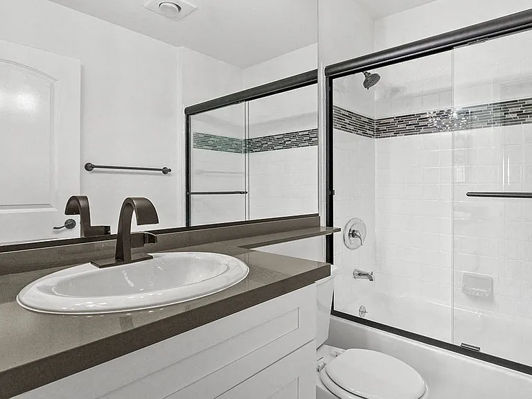 Modern styled bathroom with shower and tub.