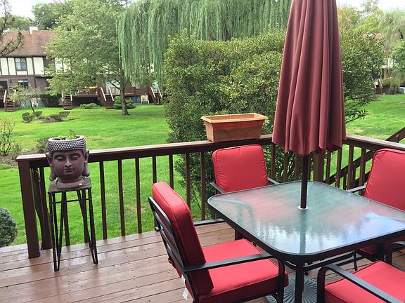 Deck overlooking grassy yard