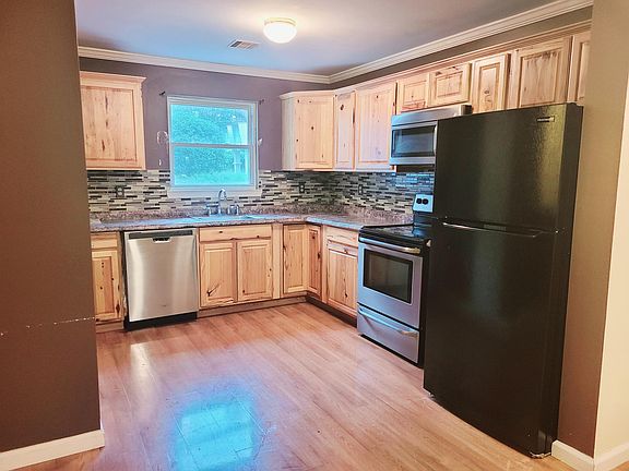 Beautiful countertops and appliances and cabinets