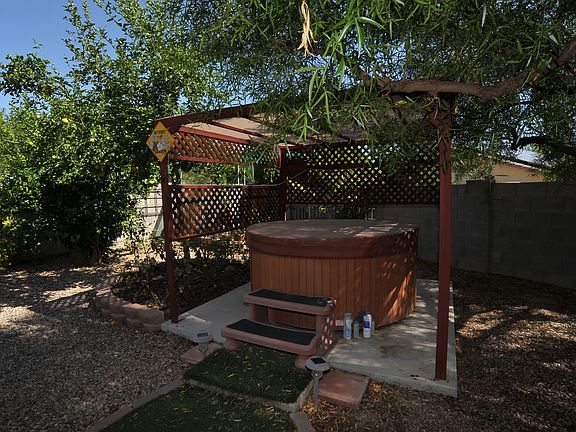 Lush landscaping and hot tub