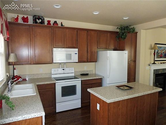Main level kitchen. New granite surface counters, island, hard