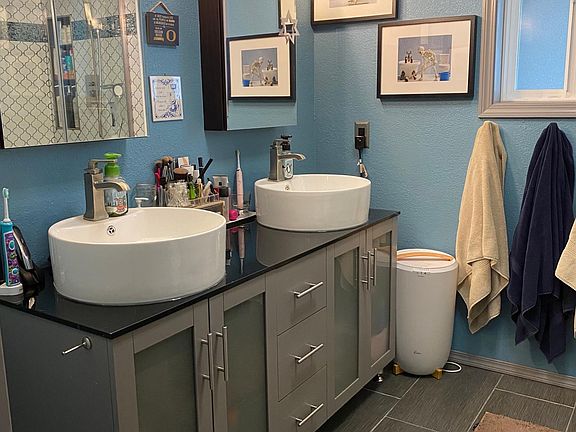 Master bathroom double vanity with fog-free medicine cabinets