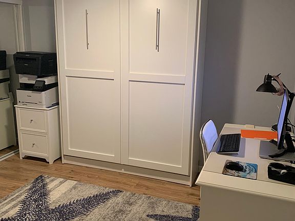 Second bedroom as an office or pull down the murphy bed for a bedroom. Very versatile room.