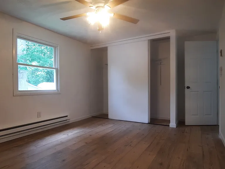 Bedroom number two, new window overlooks the street/front door