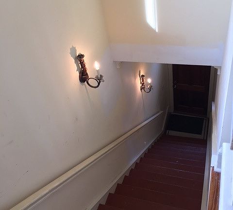 Stairs from front door up to 2nd floor