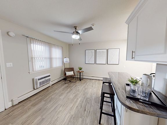 Our open living concept features a breakfast bar overlooking the living area for a seamlessly blended space for optimal studio living.