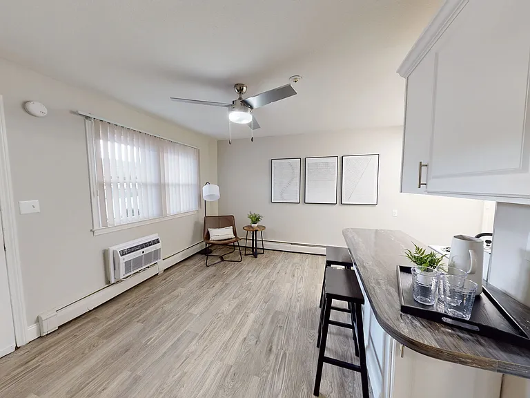 Our open living concept features a breakfast bar overlooking the living area for a seamlessly blended space for optimal studio living.