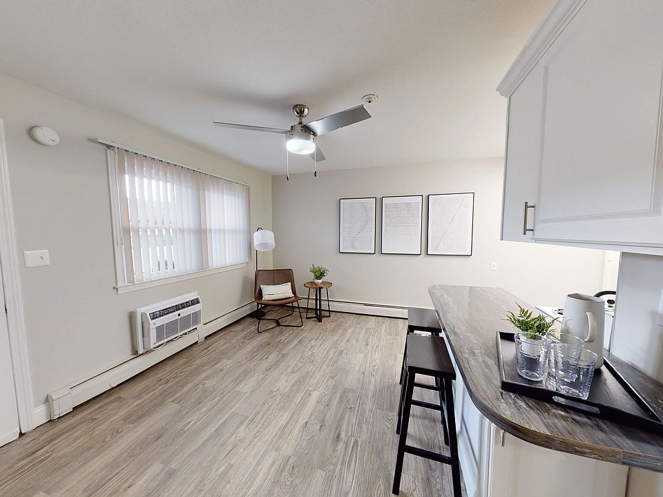Our open living concept features a breakfast bar overlooking the living area for a seamlessly blended space for optimal studio living.
