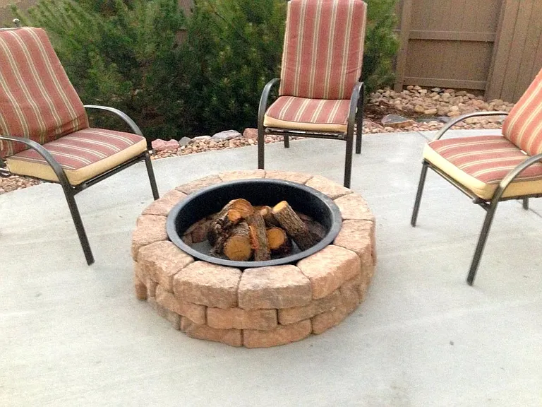 Backyard has a nice big concrete patio