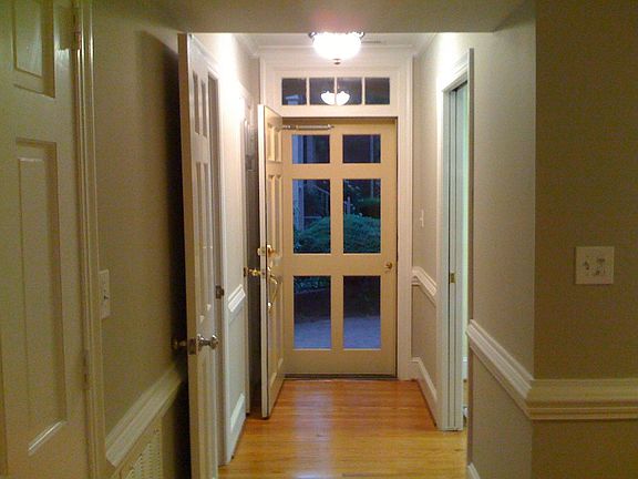 View through 1st hallway to front door