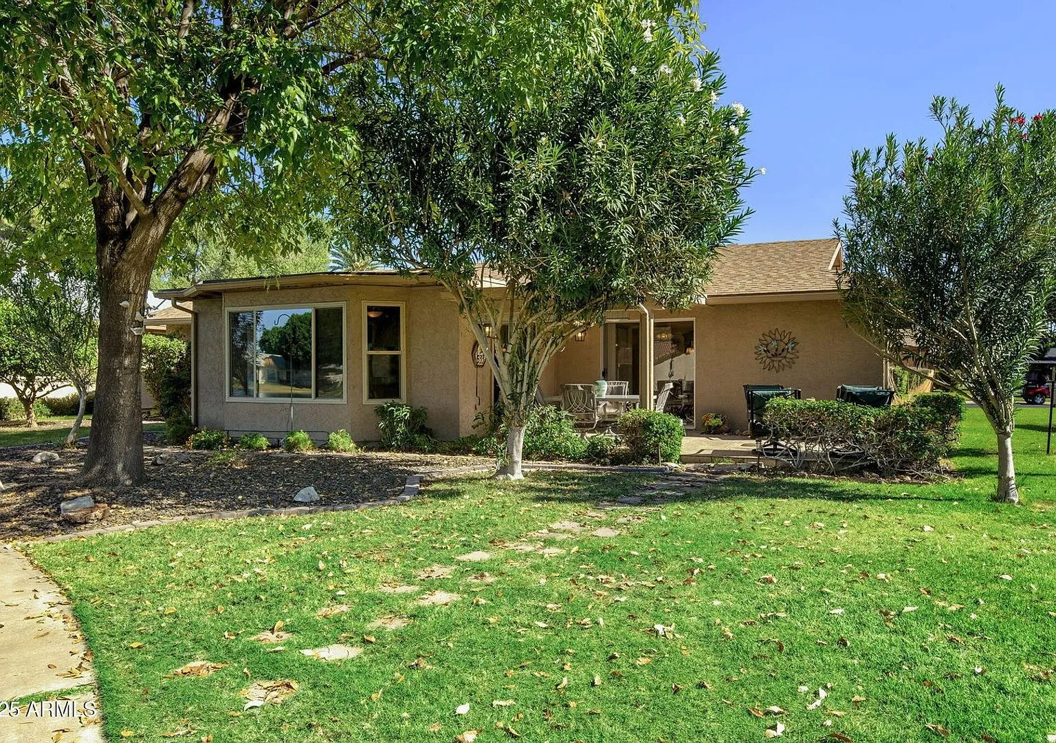 Welcome to this stunning updated 2-bedroom, 2-bathroom home on a lake located in the vibrant comm... — Photo 3