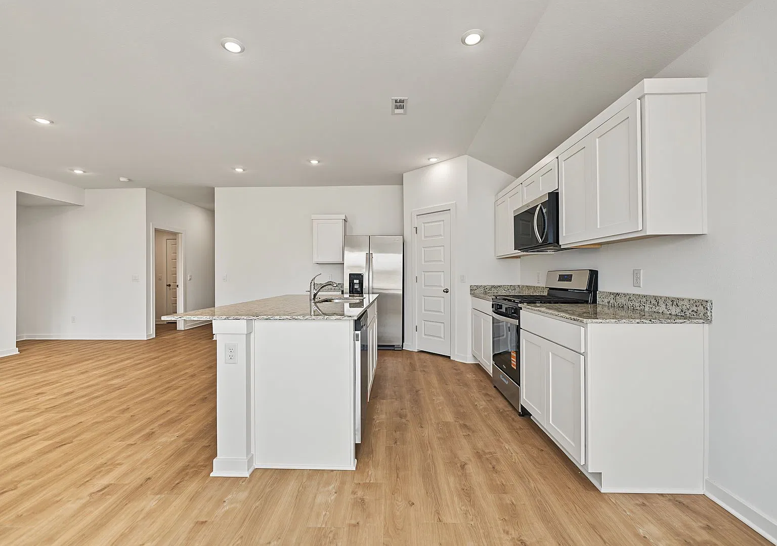 Light-Filled 4-Bedroom Home with Open Floor Plan — Photo 4